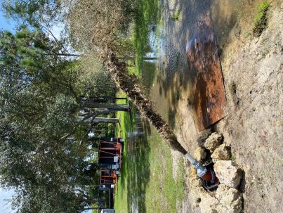 An irrigation mainline flush in progress